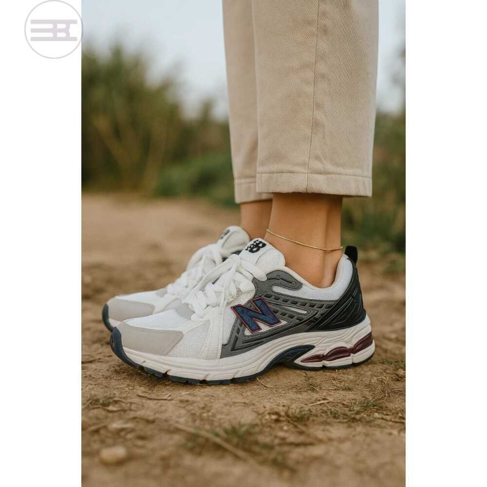 New Balance White Sneakers with Navy and Red Accents